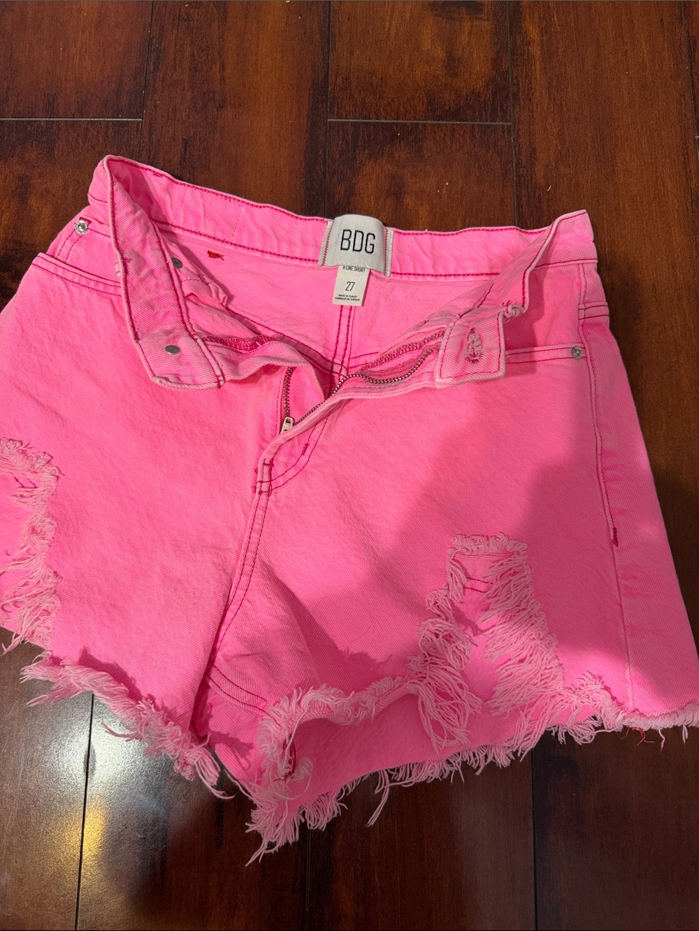 BDG Neon Pink Distressed Denim Cutoff Shorts